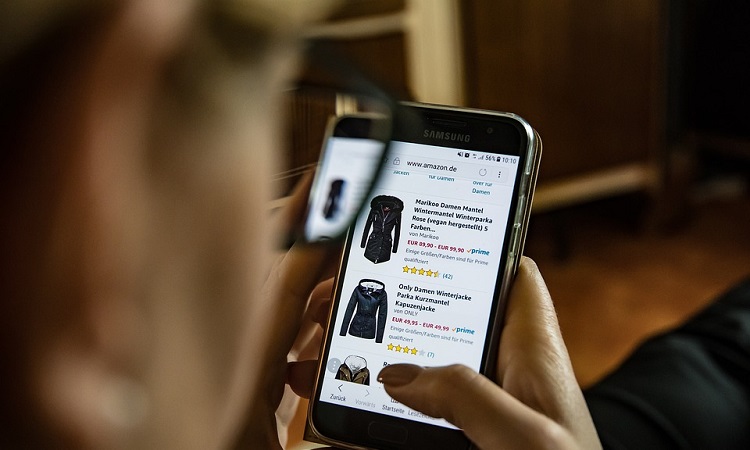 Person shopping online on smartphone