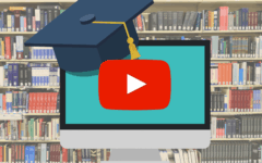 Graduation cap on top of computer screen
