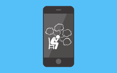 A graphic of a smartphone with an icon of a stressed person displayed on the screen